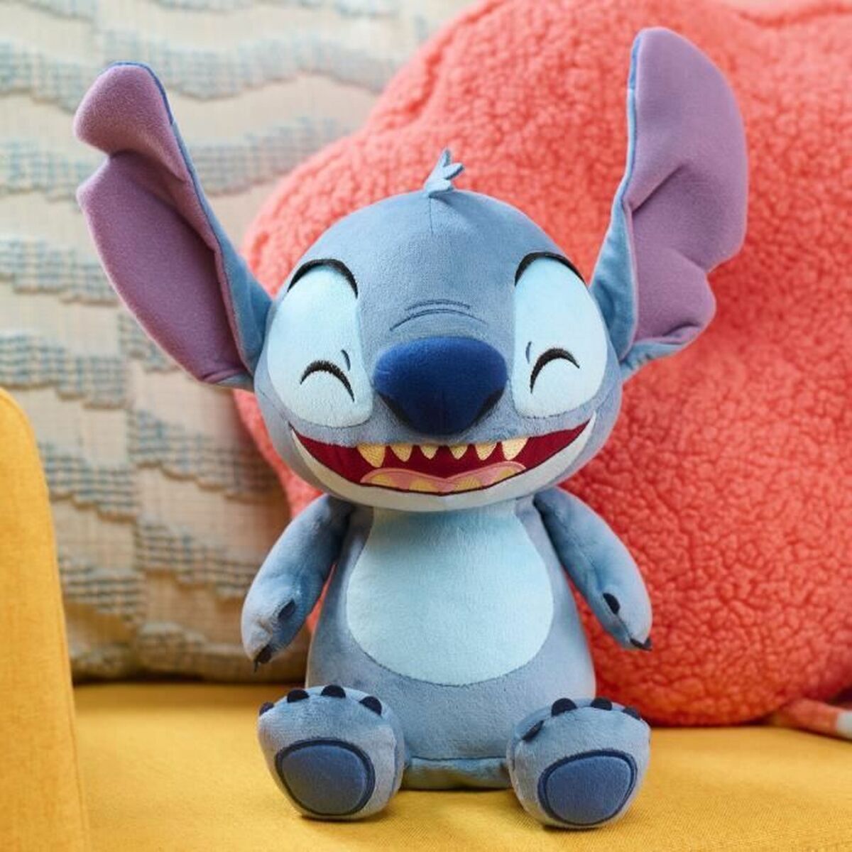 peluche stitch bleu assise